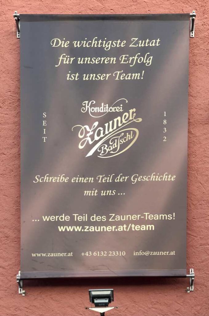 Poster on the facade of the employee residence of the Zauner confectionery.