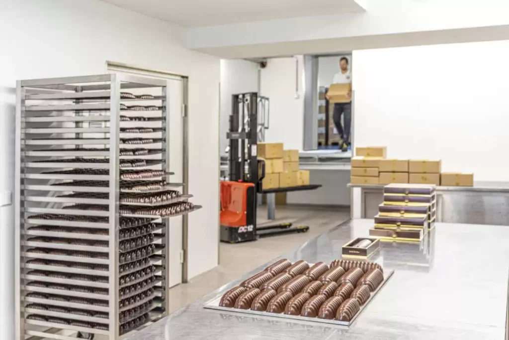 View of the bakery. Produced fence sections lie on the work surface.