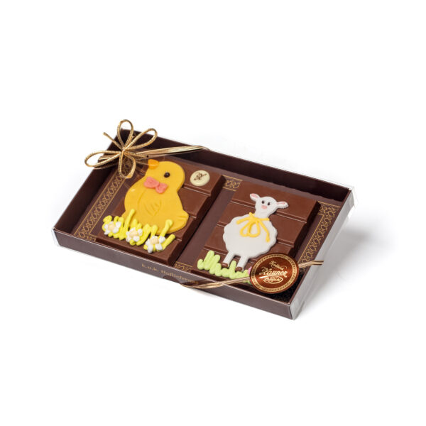 Gift box with two bars of chocolate and Easter decoration