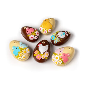 Hand-decorated chocolate eggs in white and light chocolate