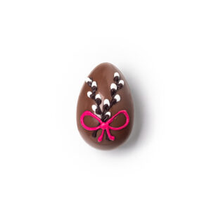 Chocolate egg with almond bitter nougat and Easter decoration