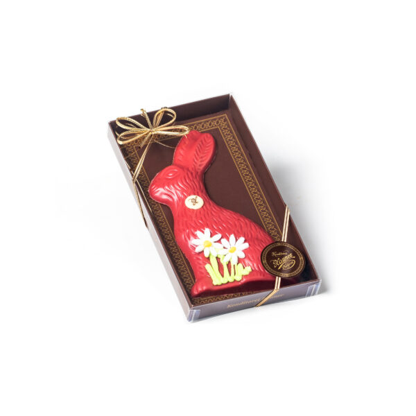 Brown gift box with Easter bunnies made of red chocolate